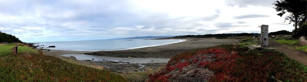 Panoramic view of beach against sky