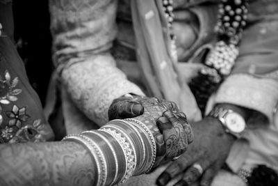 Bridegroom promising each other that they wil stay together for rest of there life..