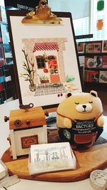 Close-up of open book on table at home