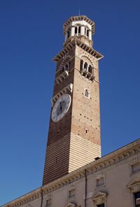 Low angle view of clock tower against sky