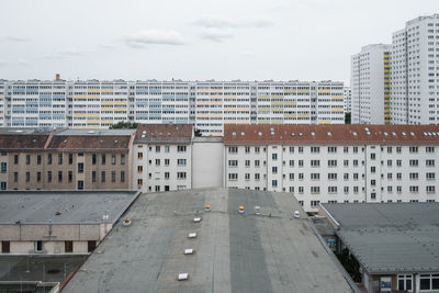 High angle view of buildings against sky in city