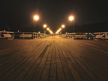 Illuminated street lights at night