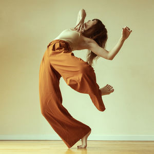 Low section of woman standing on floor