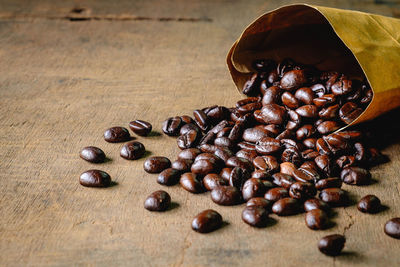 Close-up of coffee beans on table