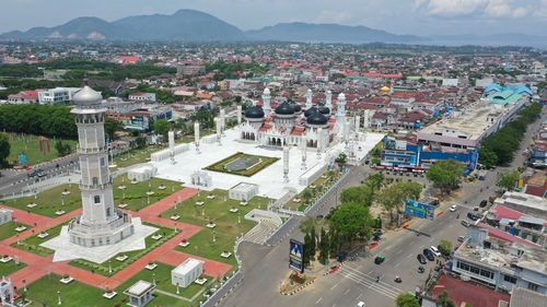 High angle view of street amidst buildings in city