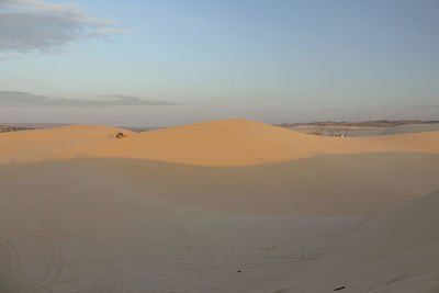 Scenic view of desert against sky