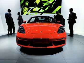 Close-up of red car on white background
