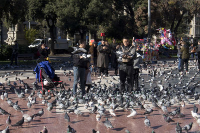 People standing on street in city