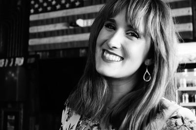 Close-up portrait of smiling beautiful woman