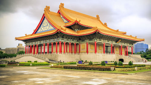 View of building against cloudy sky