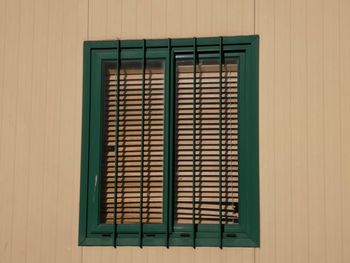 Close-up of closed window of building