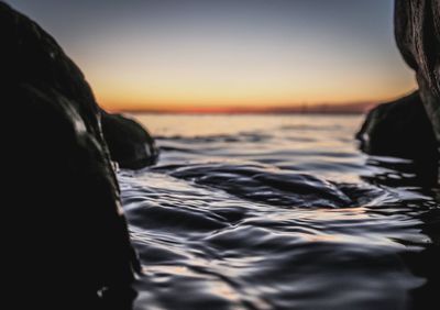 Scenic view of sea at sunset