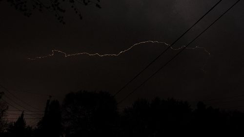 Low angle view of electricity pylon