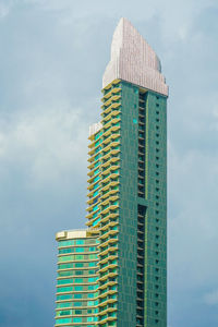 Low angle view of modern buildings against sky