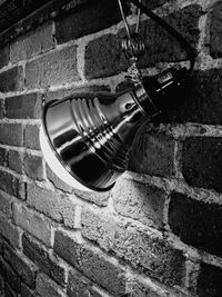 High angle view of old electric hanging on wall