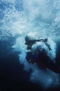 Jonathan kingston enters the water in the channel islands.