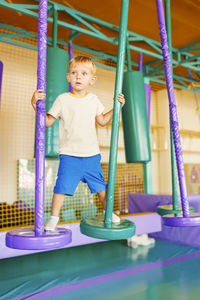 Boy playing in playground