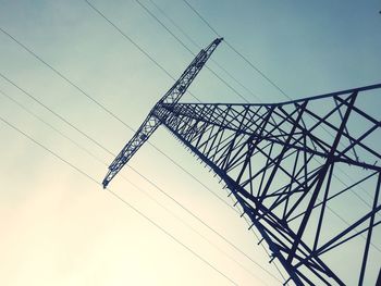 Low angle view of cables against sky