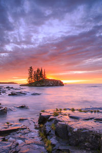 Scenic view of sea against sky during sunset