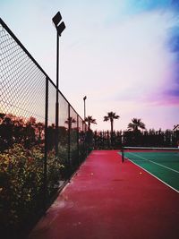 View of basketball court at sunset