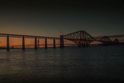 View of suspension bridge at night