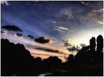 Scenic view of landscape against sky at dusk