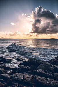 Scenic view of sea against sky during sunset