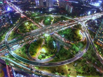 High angle view of illuminated street at night