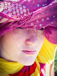 Close-up of woman wearing scarf