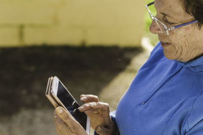 Senior woman using smart phone