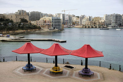 Malta - man taking rest in the st. julian's bay malta in a rainy day