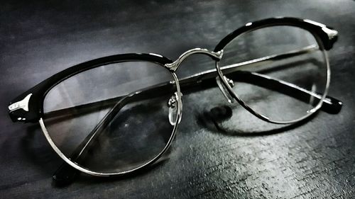 Close-up of sunglasses on table