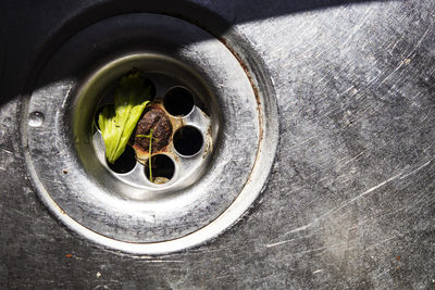 High angle view of hole in container