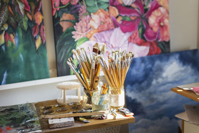 Paintbrushes in artist studio