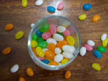 High angle view of multi colored candies on table