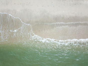 Close-up of water splashing in sea