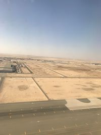 Scenic view of desert against clear sky