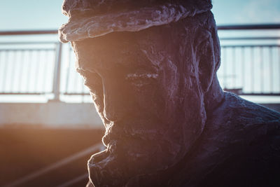 Close-up of sculpture against window