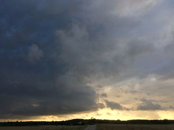 Low angle view of dramatic sky during sunset