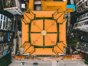 High angle view of street amidst buildings in city