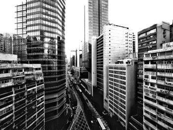 Modern buildings in city against sky