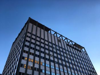 Low angle view of modern building against clear sky