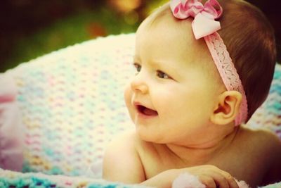 Close-up of cute baby outdoors