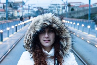 Portrait of young woman with snow in mouth