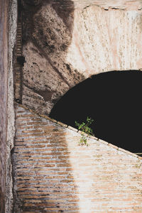 Low angle view of stone wall of old building