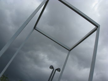 Low angle view of metal structure against sky