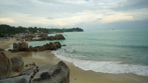 Scenic view of sea against sky in tanjung pesona beach
