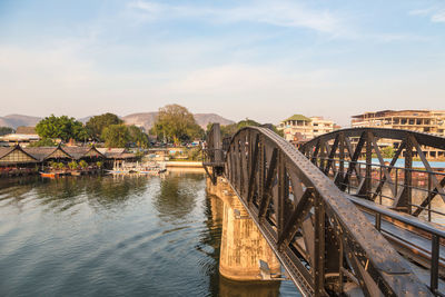 Bridge over river against sky