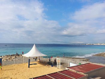 Scenic view of beach against sky