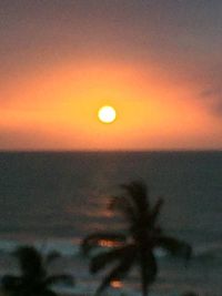 Scenic view of silhouette land against sky during sunset